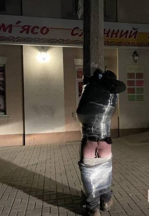 In Ukrainian cities looters are tied to poles with food foil.